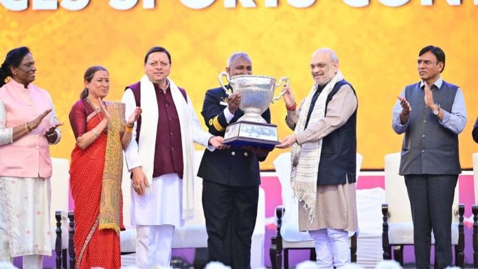 Union Home Minister Amit Shah and Uttarakhand CM Pushkar Singh Dhami, with other ministers, at the closing ceremony of the 38th National Games in Golapar. | By special arrangement