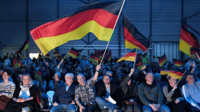 AfD supporters attend the party’s election campaign launch in the town of Halle, Saxony-Anhalt. | Alamy/dpa