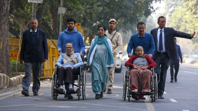 AAP National Convener Arvind Kejriwal, along with his family, casts his vote in the Delhi Assembly election in New Delhi on Wednesday | Photo: Suraj Singh Bisht | ThePrint