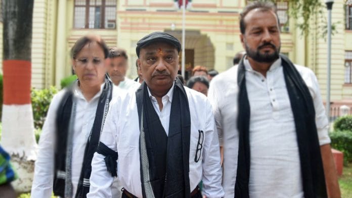 Rashtriya Janata Dal (RJD) leader Sunil Singh leaves the Bihar Assembly after being expelled from the Legislative Council for mimicking Chief Minister Nitish Kumar during the Monsoon Session, in Patna, in July 2024. | ANI