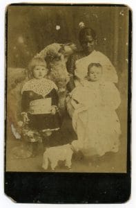 Indian nanny, white children, toy poodle dog. Cabinet Photo | By special arrangement