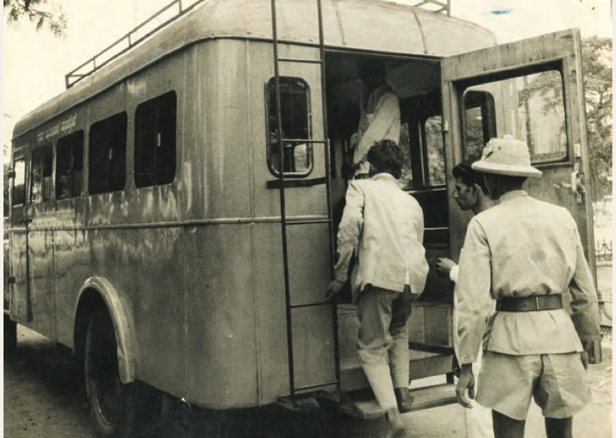Traffic violators entering a mobile court in Bengaluru, established in 1974