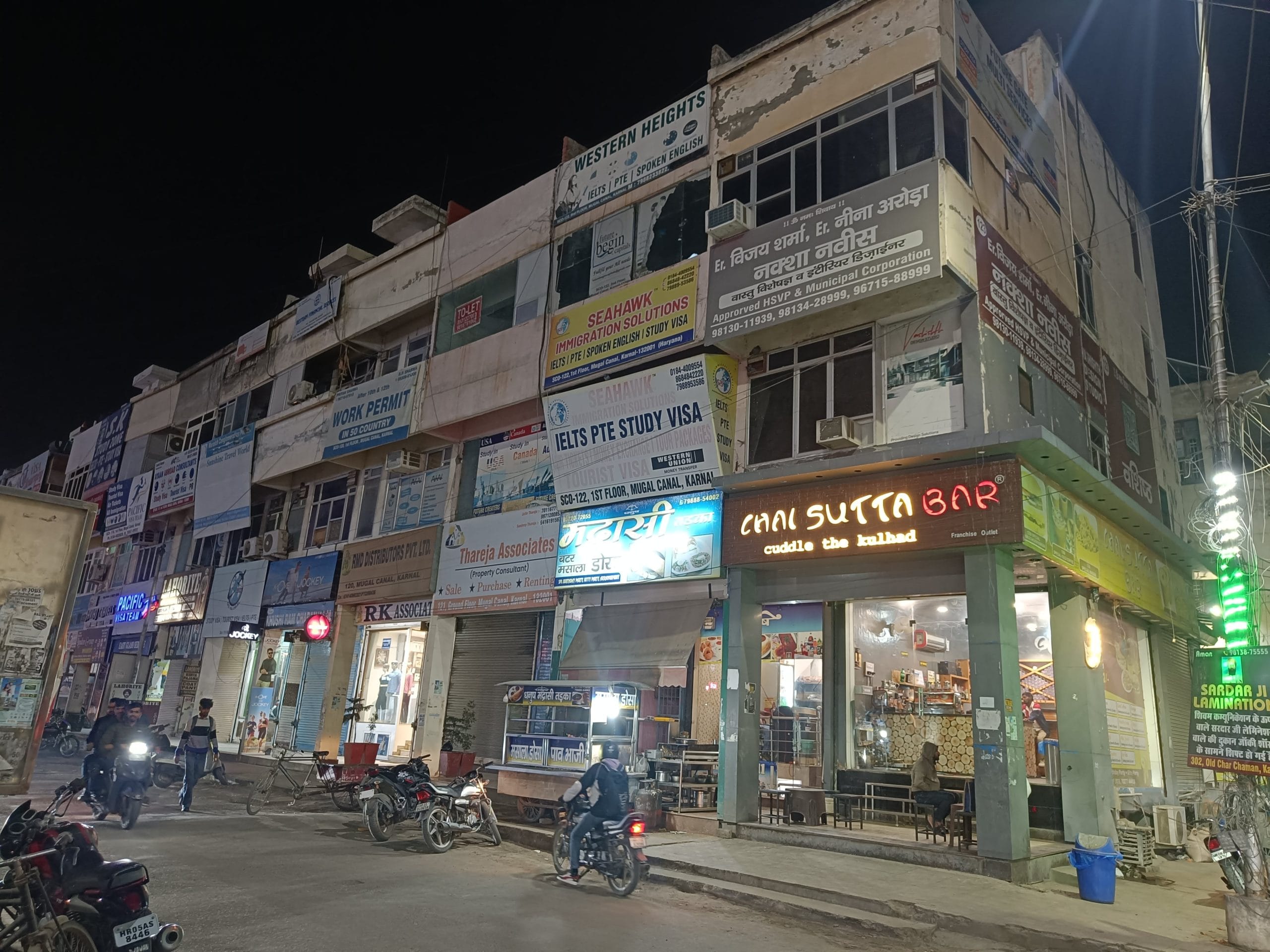 Offices of travel consultancies in Karnal's Mughal Canal Road | Photo: Krishan Murari/ThePrint