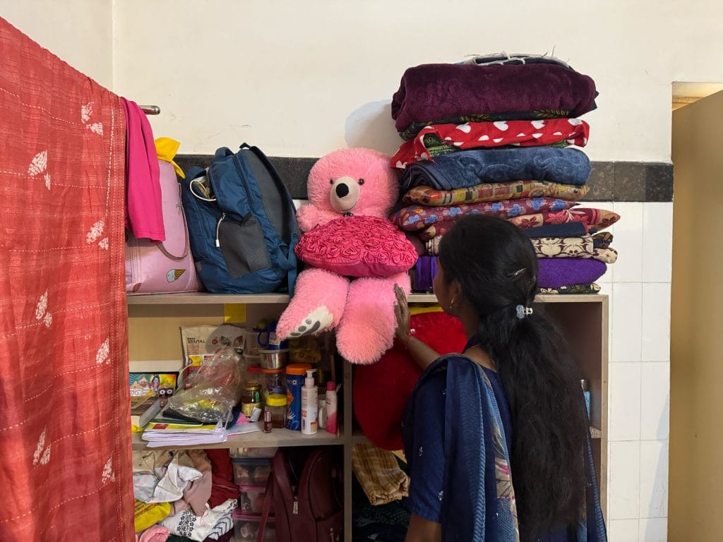 Pranatee in the hostel room she shares with seven others. Her mantra — earn and learn first, marry second | Photo: Sagrika Kissu, ThePrint