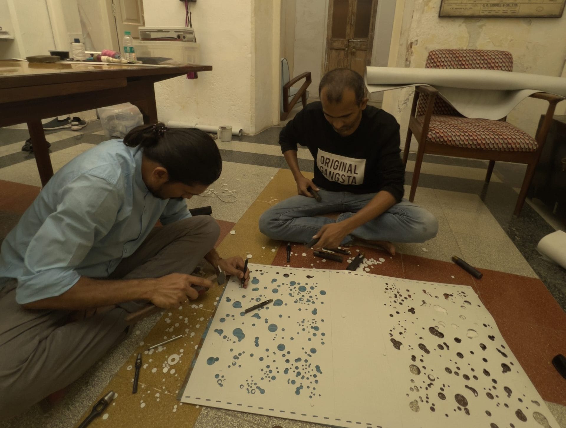 Rajbhar working on a handbag for his latest collection