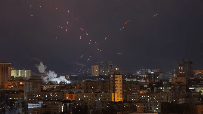 Tracers are seen in the night sky as Ukrainian servicemen fire at the drone during a Russian drone strike, amid Russia's attack on Ukraine, in Kyiv, Ukraine on 21 February 2025. | File Photo | Gleb Garanich | Reuters