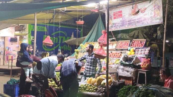 Dilip Khatik at his fruit stall in Jirapur | Iram Siddique | ThePrint