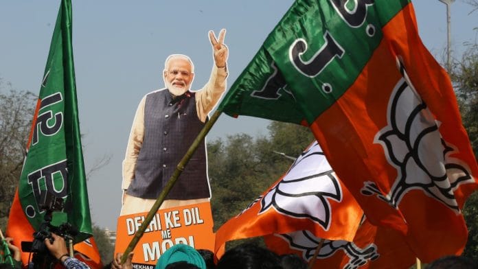 BJP workers celebrating party's win at Delhi office, Saturday | Suraj Singh Bisht | ThePrint