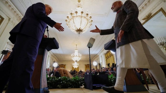 Representational image | Prime Minister Narendra Modi and US President Donald Trump shake hands after their meeting at the White House in February 2025 | Photo: Reuters/ANI
