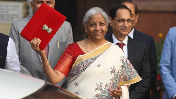 Union Finance Minister Nirmala Sitharaman with the budget documents outside the Finance Ministry. | Suraj Singh Bisht | ThePrint