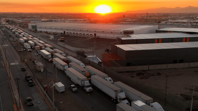 A drone view shows trucks waiting in line near the Zaragoza-Ysleta border crossing bridge to cross into the U.S., in Ciudad Juarez, Mexico on 31 January 2025. | Jose Luis Gonzalez | Reuters