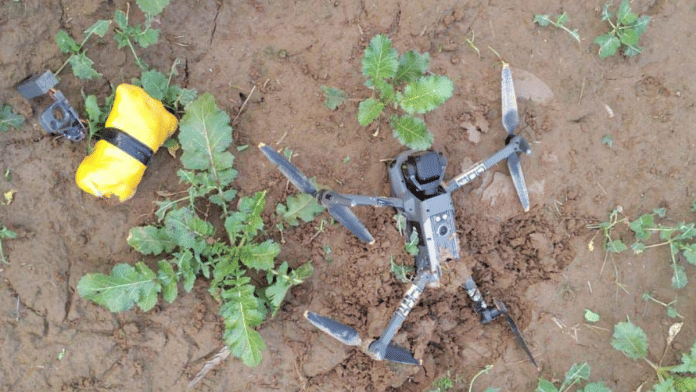 A DJI Mavic 3 Classic drone and a packet of heroin recovered from a farming field near Hardoratan village in Punjab's Amritsar district | X/@BSF_Punjab