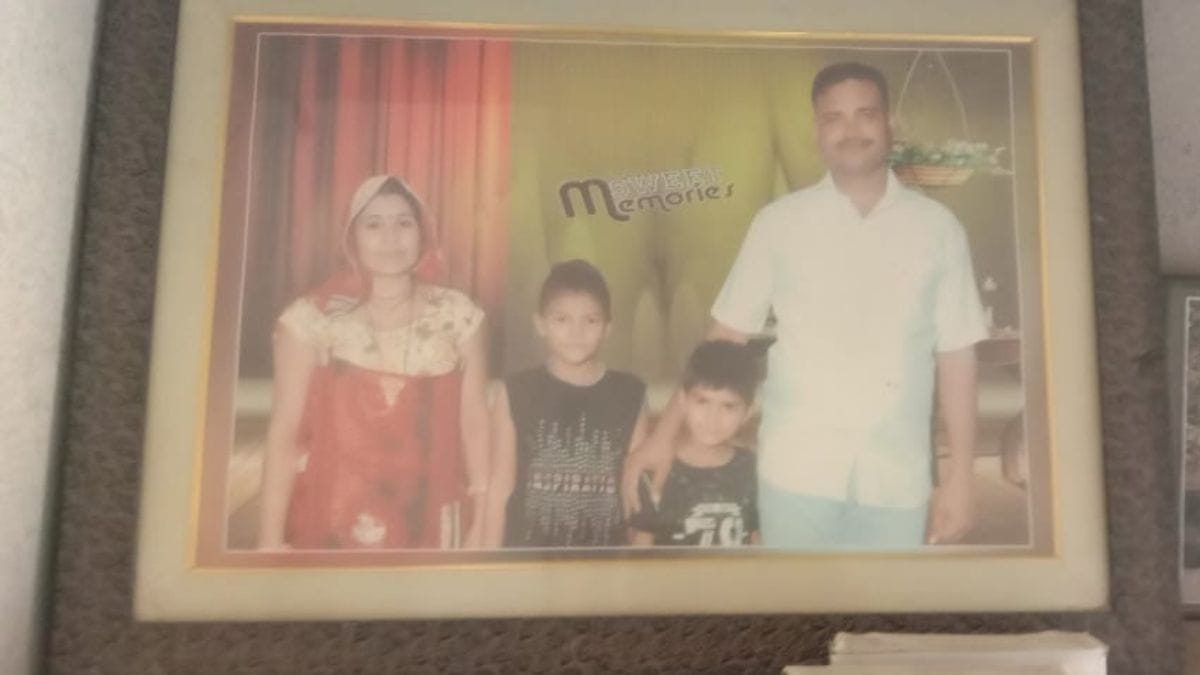 A photo of Sanjay Kumar with his family at his home | Mayank Kumar | ThePrint