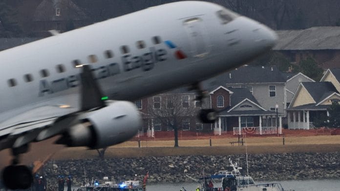 An American Eagle plane departs the Ronald Reagan Washington National Airport, as search and rescue teams work nearby, in the aftermath of the collision of American Eagle flight 5342 and a Black Hawk helicopter that crashed into the Potomac River, in Arlington, Virginia, U.S., January 31, 2025 | Reuters