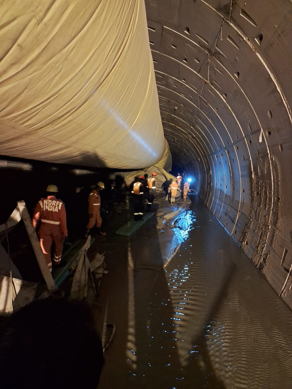 Rescuers make their way through the tunnel | Prasad Nichenametla | ThePrint