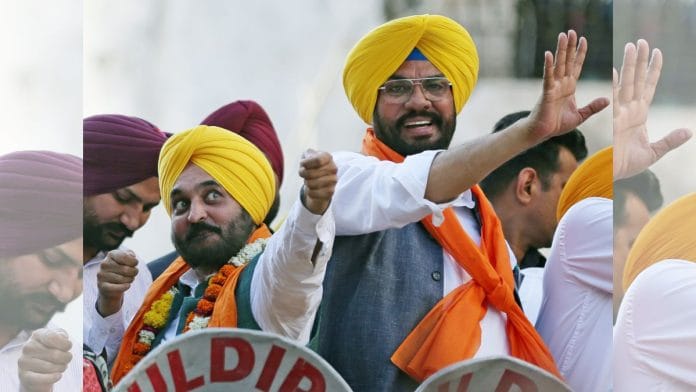 File photo of Punjab Chief Minister Bhagwant Mann and minister Kuldeep Singh Dhaliwal at a roadshow | ANI