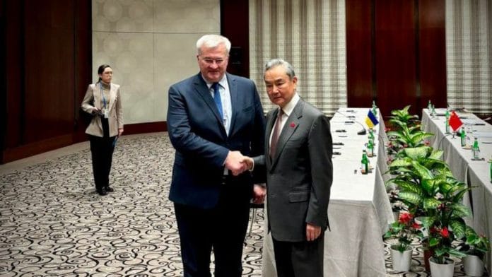China’s foreign minister Wang Yi and and his Ukrainian counterpart, Andrii Sybiha, 16 February