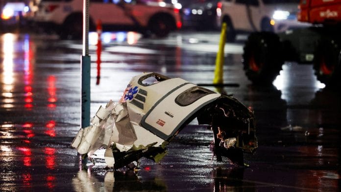 Debris of the aircraft lies on the ground at the site of a plane crash in Philadelphia, Pennsylvania, U.S., January 31, 2025 | Reuters