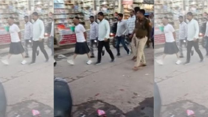 Screenshot of the man purportedly being paraded in a skirt in Rewari