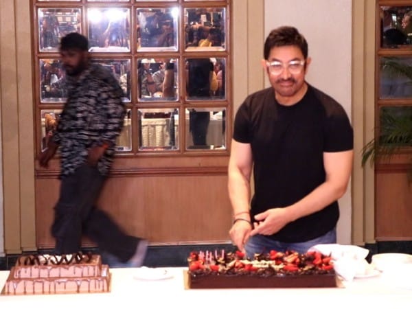 Aamir Khan celebrates 60th birthday with media, cuts cake 