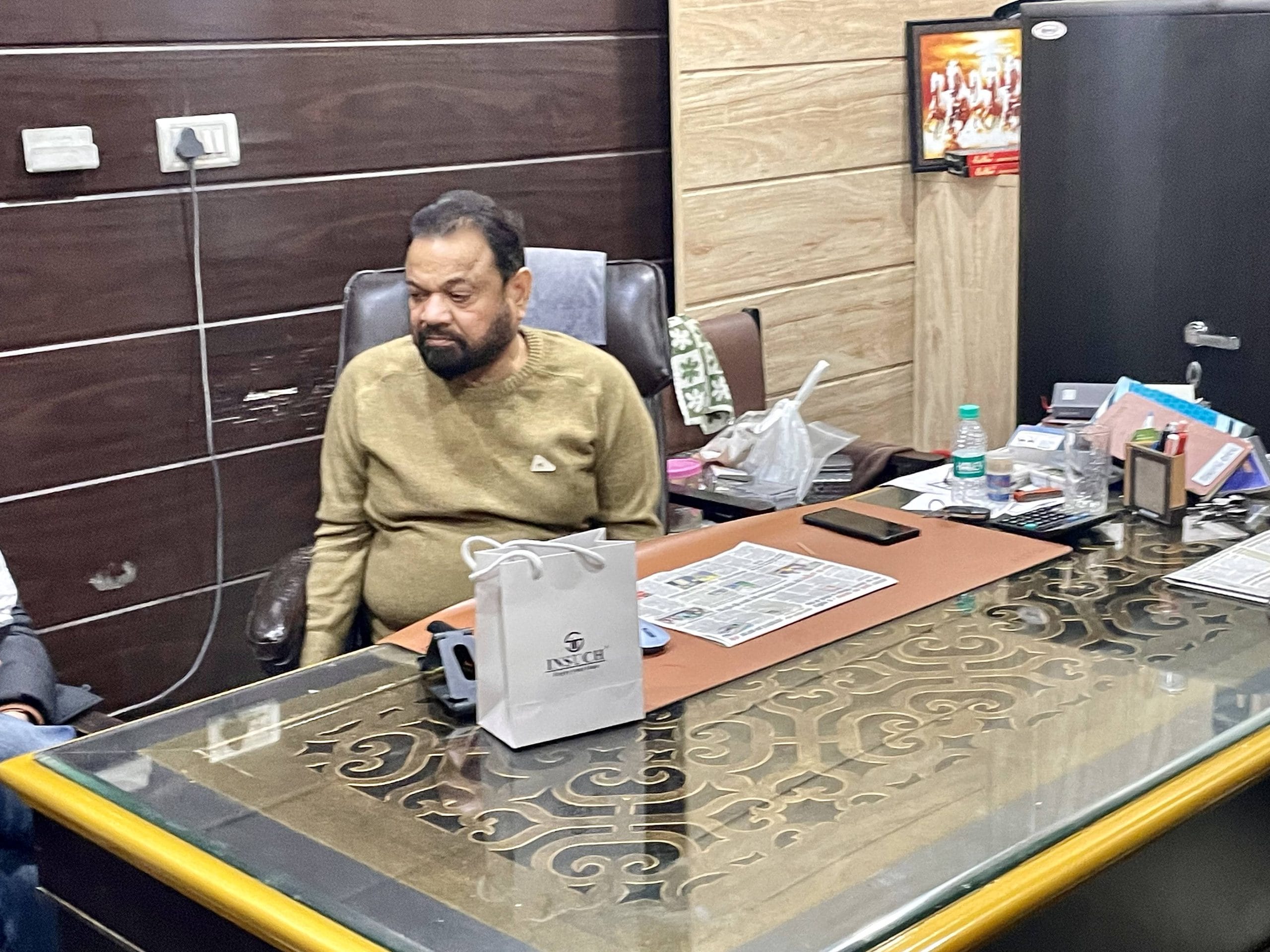 Ludhiana based businessman Alimuddin Saifi rests at the office in his hotel. He migrated here from Muzaffarnagar; he, his brothers, and their entire families have been in Ludhiana for over three decades | Photo: Sabah Gurmat