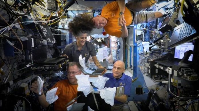 NASA astronauts Sunita Williams, Nick Hague, Barry Wilmore, and Donald Pettit unbox Thanksgiving meals, from the International Space Station (ISS), in this screen grab taken from a handout video, released on November 26, 2024. NASA/Handout via REUTERS/File Photo