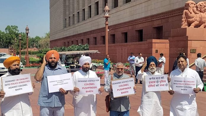 MPs hold a protest demanding justice for Colonel Pushpinder Singh Bath, who was allegedly assaulted by Punjab Police personnel in Patiala | Photo: ANI