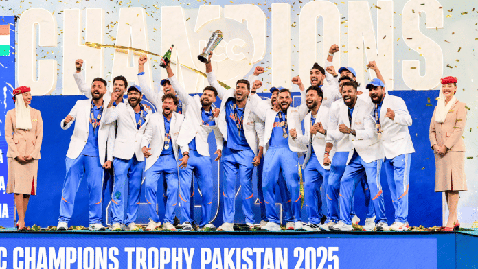 Indian players celebrate with the trophy after winning the ICC Champions Trophy 2025 final match against New Zealand, at Dubai International Cricket Stadium in Dubai. | ANI