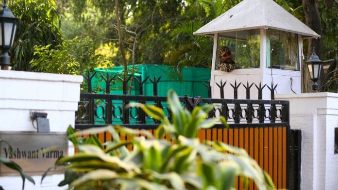 CRPF personnel manning gate of government bungalow allotted to Justice Yashwant Varma, Wednesday | Suraj Singh Bisht | ThePrint