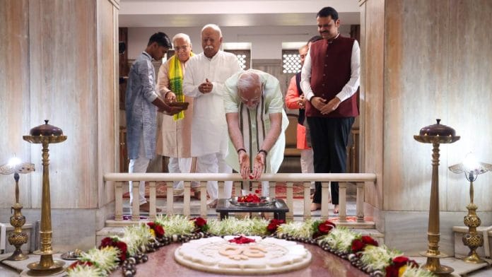PM Narendra Modi pays tributes at Smruti Mandir in Nagpur along with RSS chief Mohan Bhagwat and Maharashtra CM Devendra Fadnavis Sunday | Photo: X/@narendramodi