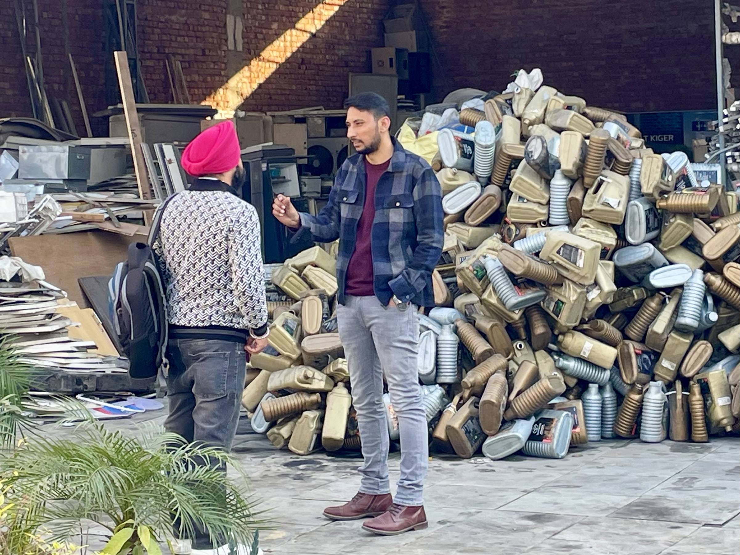 Mohammad Ahad, 34, inspects the e-waste recycling plant along with his employees at the migrant hub of Sahnewal in Ludhiana district. Ahad spent his childhood in Ludhiana, with his father moving here from Saharanpur | Photo: Sabah Gurmat