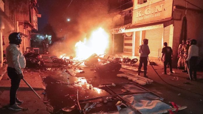 Fire dousing operations after a clash broke out between two groups at Mahal area in Nagpur | ANI