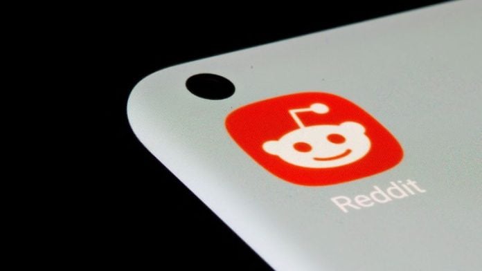 A photo of the Reddit app logo