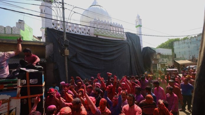 Holi procession passing through Shahi Jama Masjid in Sambhal, Friday | Manisha Mondal | ThePrint