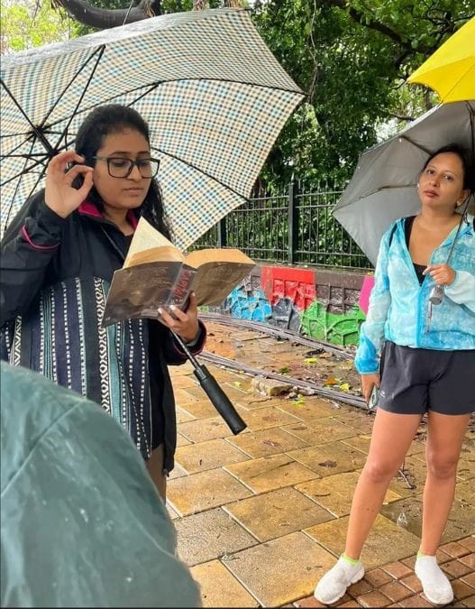 Gupta narrating a chapter about the history of water in one of her previous walks to participants