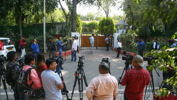 Media personnel gathered outside the official residence of Justice Yashwant Varma in New Delhi on Wednesday | Suraj Singh Bisht ThePrint