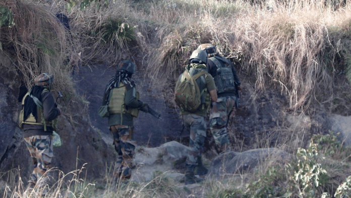 Security personnel during an anti-terrorist operation at a remote forested area in J&K's Kathua district on Friday | PTI