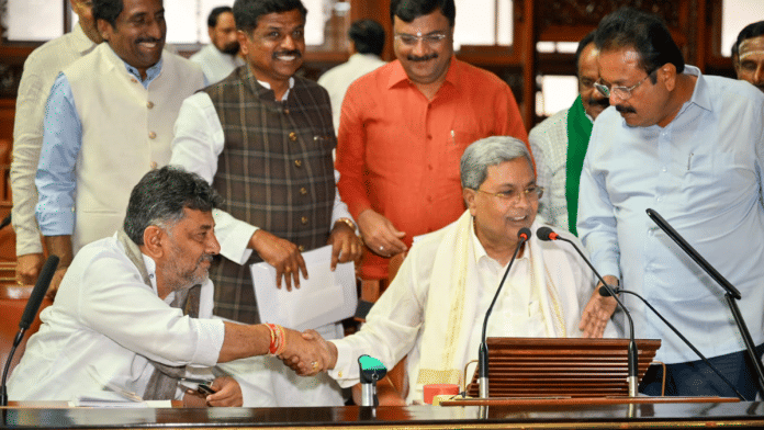 Karnataka Deputy CM D.K. Shivakumar (left) wth CM Siddaramaiah inside the assembly in Bengaluru on Friday | By Special Arrangement