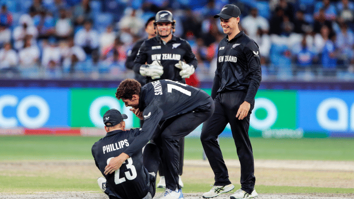 New Zealand's Glenn Phillips and Captain Mitchell Santner celebrate the wicket of India's Shubman Gill during the ICC Champions Trophy, 2025 final match at Dubai International Cricket Stadium | ANI