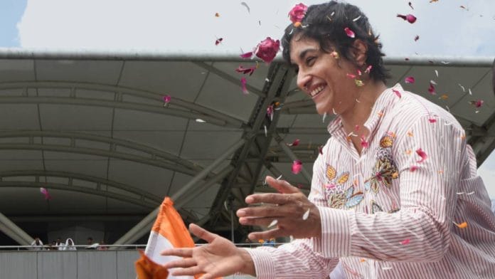 Wrestler Vinesh Phogat receives a warm welcome upon arriving at Indira Gandhi International Airport after participating in the Paris Olympics 2024 | Photo: ANI