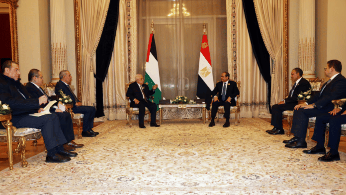 Palestinian President Mahmoud Abbas meets with the Egyptian President Abdel Fattah al-Sisi, during the emergency Arab summit organised by Egypt this week, in Cairo, Egypt on 4 March 2025.| Palestinian President Office | Handout via Reuters