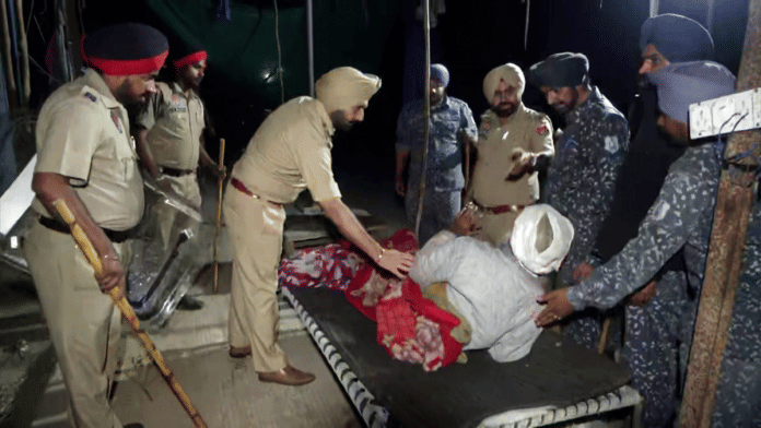 Police remove farmers at Punjab-Haryana Shambhu Border where they were sitting on a protest over various demands, on Wednesday. | ANI