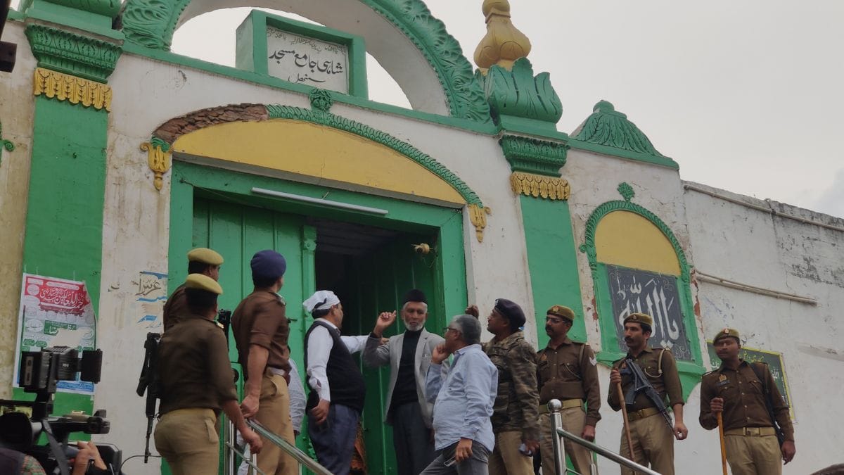 Zafar Ali with the ASI team outside the Shahi Jama Masjid | Photo: Krishan Murari/ThePrint