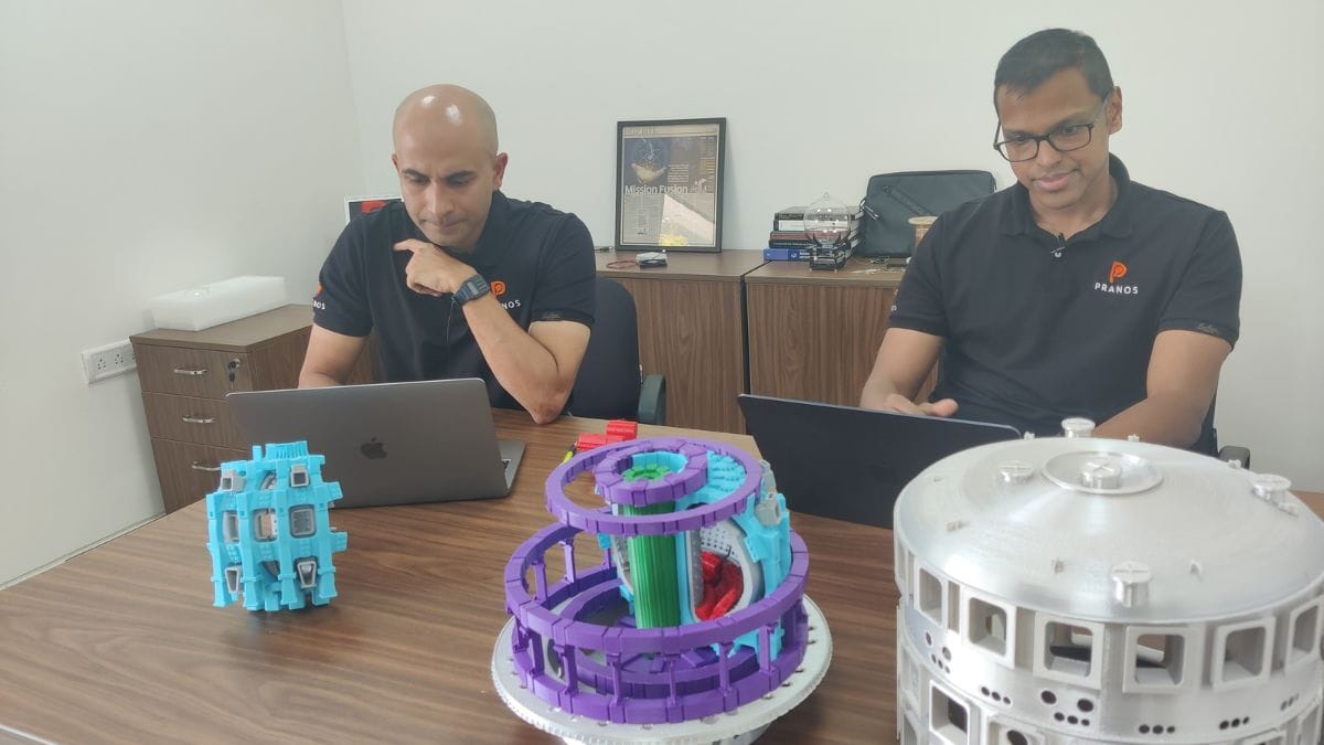 The founders with miniature of ITER, an international fusion reactor being built in France | Soumya Pillai, ThePrint