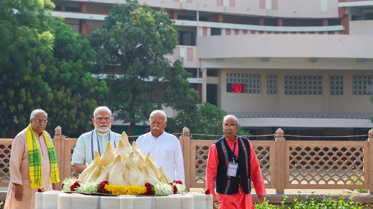 Modi Rss Walk Modi's choice after RSS headquarters visit: Trump vs Thengadi