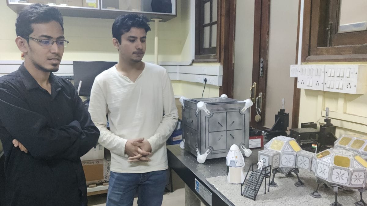 Mrityunjay Baruah and Amogh Ravindra Jadhav with the BHEEM model | Photo: Soumya Pillai, ThePrint