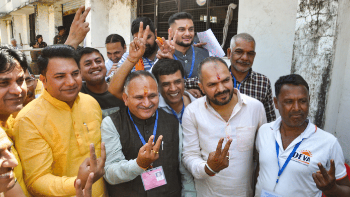 BJP candidate Rajiv Jain celebrates after winning the Municipal Corporation Mayor by-election, in Sonipat, Haryana, Wednesday, March 12, 2025.