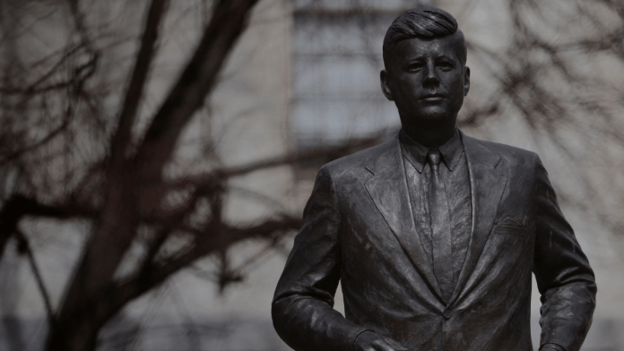 A statue of President John F. Kennedy stands outside the State House, as President Donald Trump plans to release about 80,000 pages of material related to the 1963 assassination of President Kennedy, in Boston, Massachusetts, U.S., March 18, 2025 } Reuters
