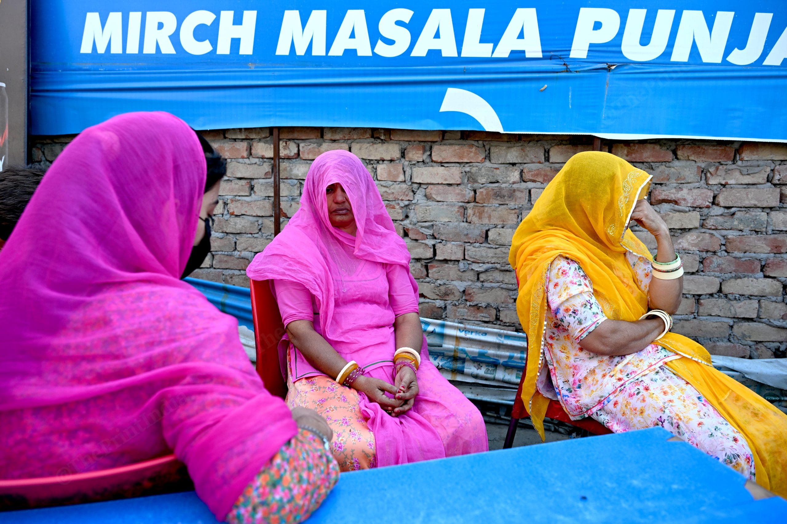 Priya Kanwer (yellow Dupatta), who is an Indian citizen and who couldn't accompany Sarita and her father, as they prepare to leave India after India revoked visas issued to Pakistani citizens, at the Attari-Wagah border crossing | Photo: Suraj Singh Bisht, ThePrint