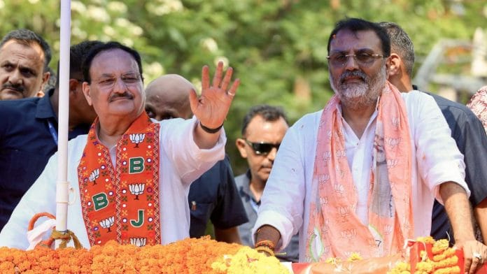 File photo of BJP National President JP Nadda with Nishikant Dubey | ANI